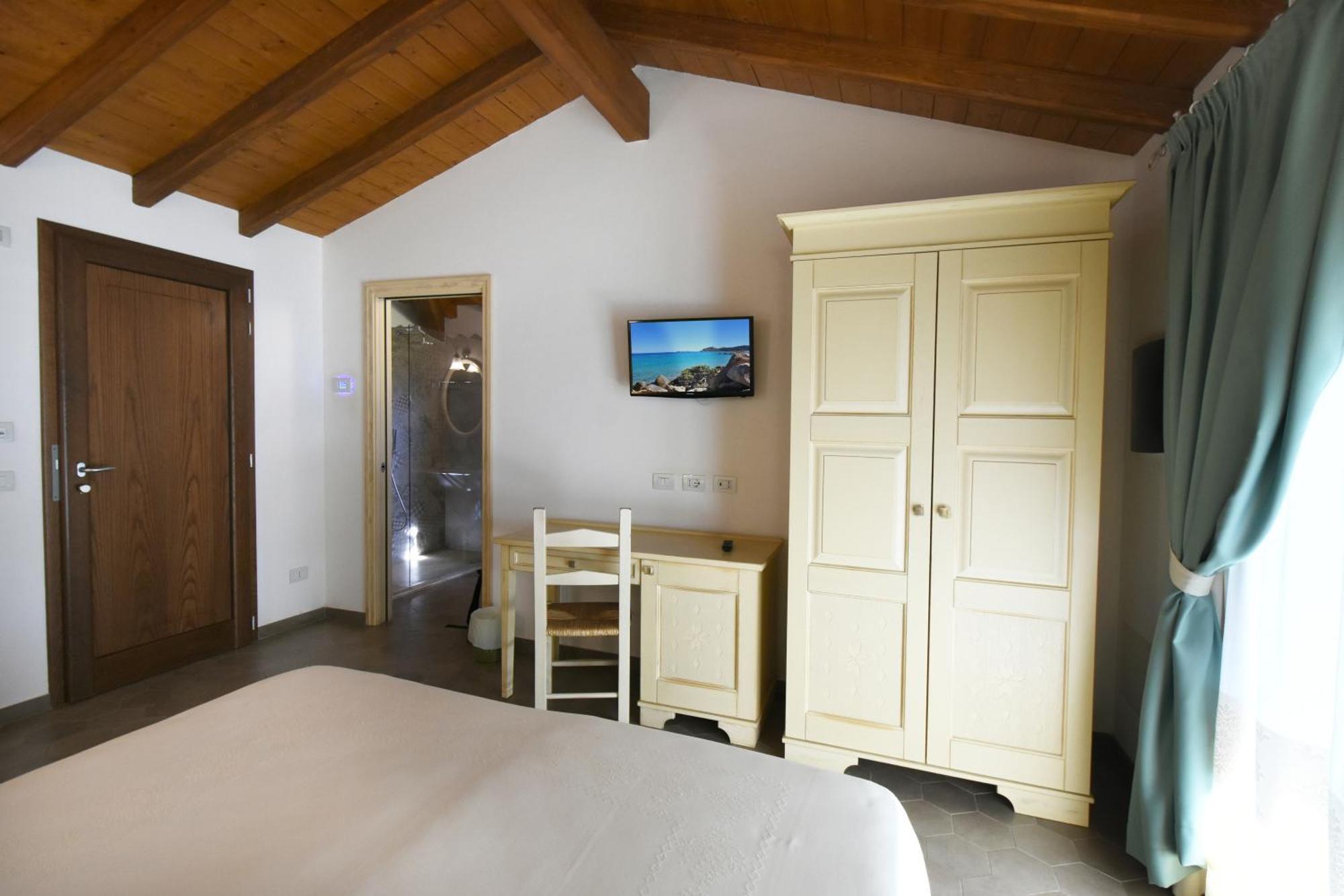 Le Anfore Hotel Вилласимиус Экстерьер фото