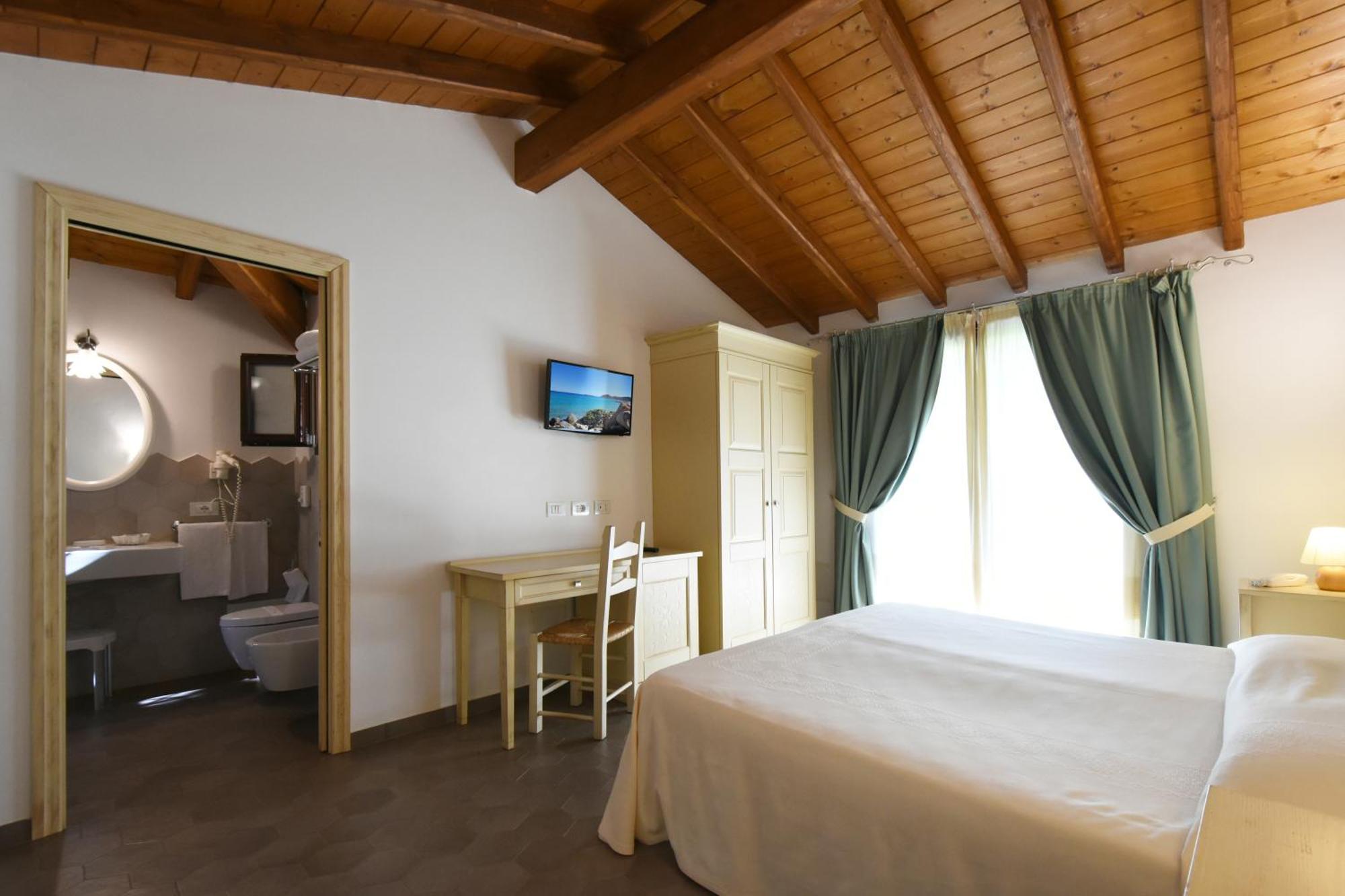 Le Anfore Hotel Вилласимиус Экстерьер фото